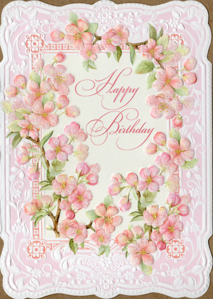 Delicate pink cherry blossoms on white embossed die cut general birthday greeting card by Carol Wilson. Inside: Lovely wishes for a wonderful day! Retail $4.25  | CRG6019 | 255423