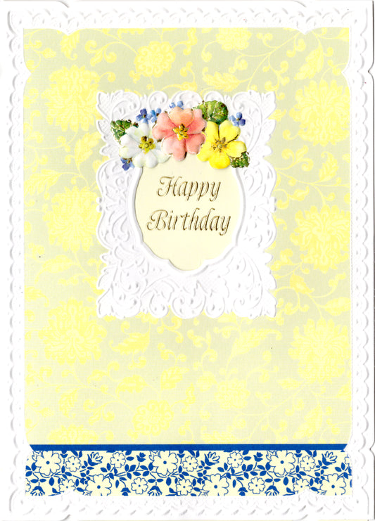 Yellow and blue floral embossed die cut general birthday greeting card by Carol Wilson. Inside: Happy Birthday may the gift of happiness be yours! Retail $3.25  | CG1397 | 255556