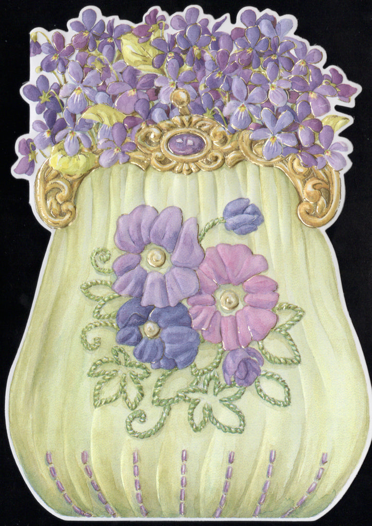 Violets in a fancy satin handbag embossed die cut general birthday greeting card by Carol Wilson. Inside: May your birthday be filled with wishes come true! Happy Birthday! Retail $3.50  | CG1169 | 255770