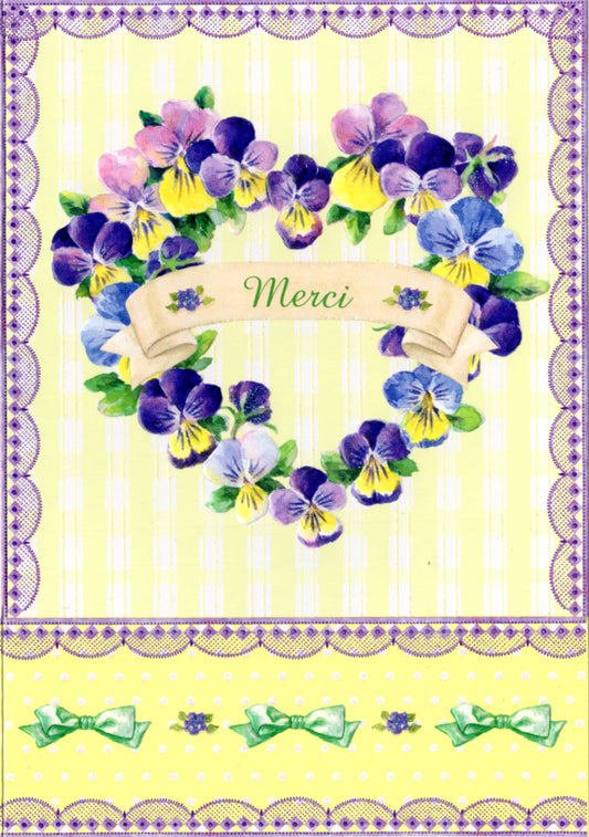 Purple and yellow violets form a heart with Merci in the middle. Thank you card by Carol Wilson. Inside: Beaucoup! You brighten my day! Retail $4.25.  | CRGN1290 | 255776